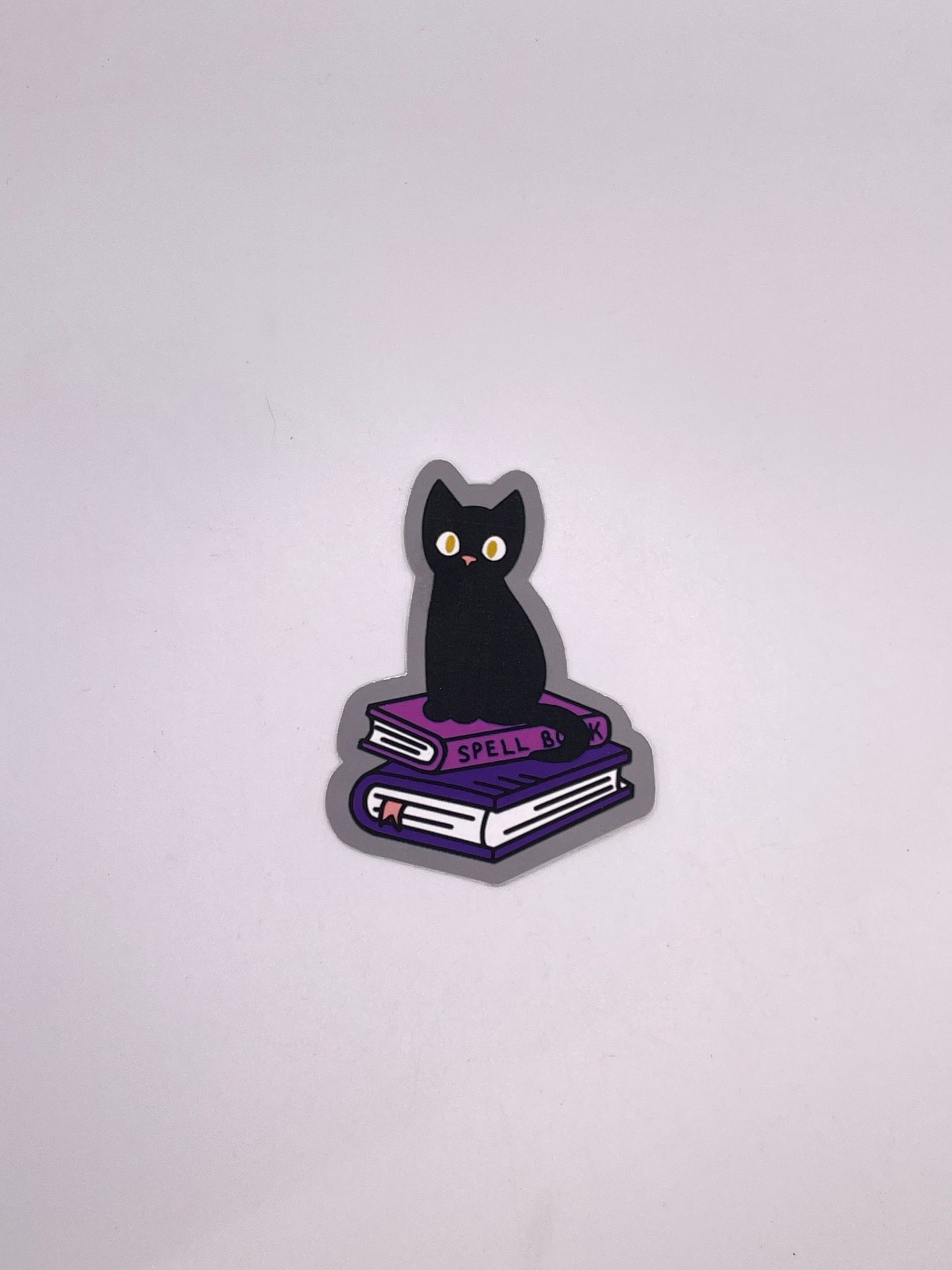 Black Cat on Books Sticker